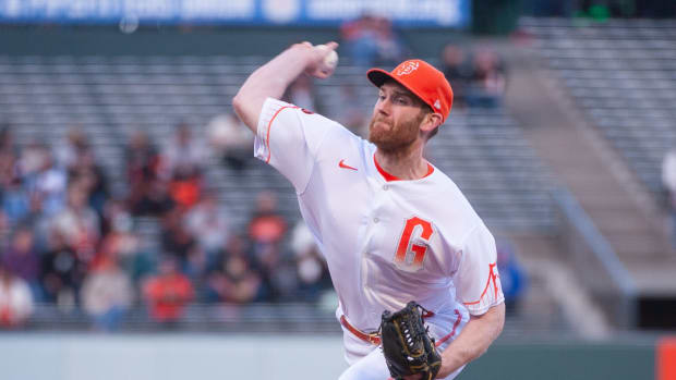SF Giants relief pitcher John Brebbia throws a pitch against the St. Louis Cardinals. (2023)